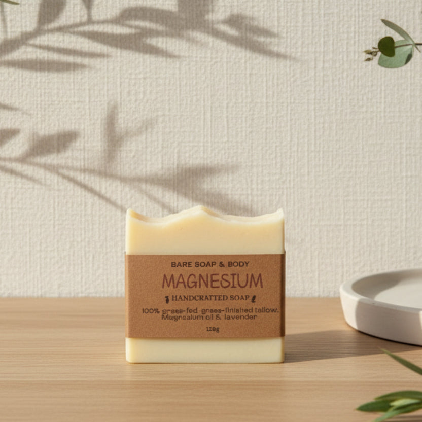 Bar of soap with a brown label on a wooden surface