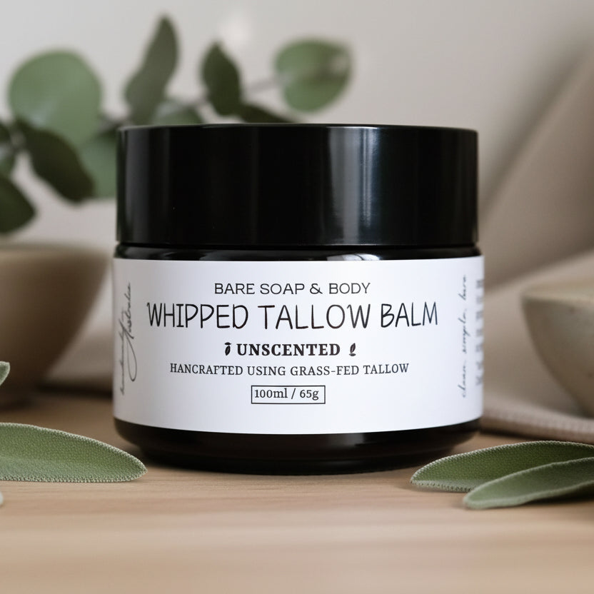 Bare Soap & Body whipped tallow balm jar on a wooden surface